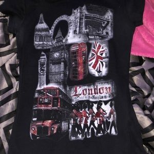 skin tight black shirt with London a aesthetic on it